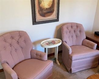 2 Mauve Occasional Chairs, rocks and swivels (some wear)  27.75"W 36"H                                                                                        $100.00 pair or $65.00 each                                                                  White Flower tea table: $35.00       