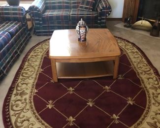Oak Coffee Table  $125.00                                                                                         
Red Oval Rug Sold