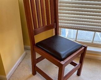 4 leather cushioned side chairs by Naura Muebles