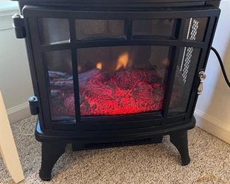 Electric remote controlled fireplace heater