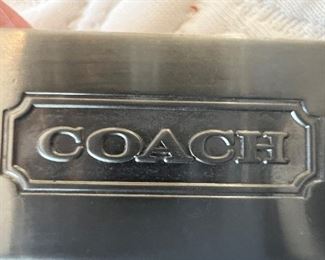 Women's white leather handbag by Coach