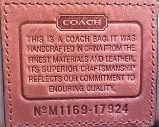 Women's brown leather handbag by Coach