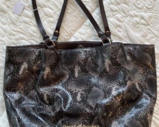 Women's black leather handbag by Dooney & Bourke