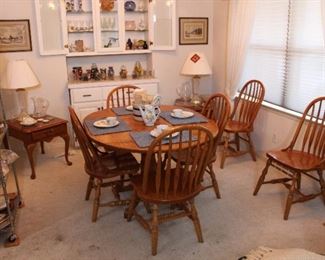 Oak dining table and six chairs