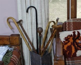 Collection of old canes and walking sticks