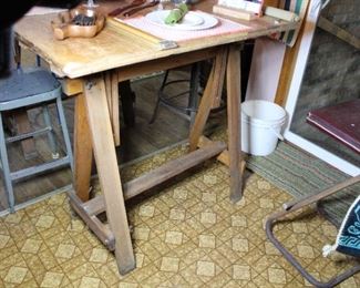 Detail of the legs of the antique drafting table, check out the old iron wingnuts and bolts!  Awesome industrial look for your home decor!