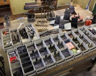 Almost every size nails, nails, and more nails.  And drill bits.  And there are bins and bags of screws, nuts, bolts, washers, hose clamps, etc. etc. etc.  Cabinets FULL of them!
