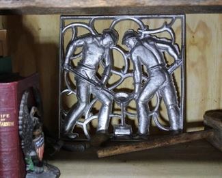 Another Large Decorative cast aluminum plaques of two men pouring molten metal in to mould