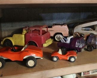 More old toy trucks and cars