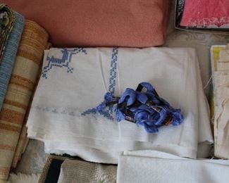 Linens that need to have embroidery finished, but include the floss to finish!