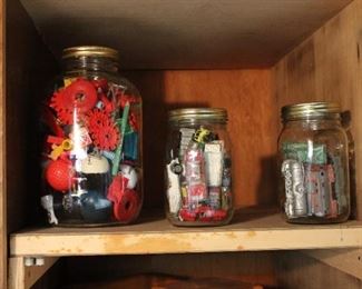 Jars of vintage toys and Matchbox and Hot Wheels cars