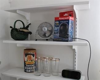 Miniature electric fan, vintage gold rimmed glasses, digital alarm clock