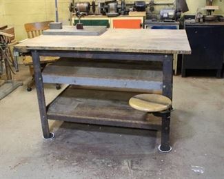 Old Custom Made workbench that would make an EXCELLENT KITCHEN ISLAND!  Solid and Stable, with attached stool!  Currently measures 60" by 42" by 38" tall.