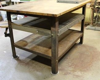 Old Custom Made workbench that would make an EXCELLENT KITCHEN ISLAND!  Solid and Stable, with attached stool!  Currently measures 60" by 42" by 38" tall.