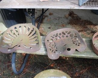 Old cast iron tractor seats
