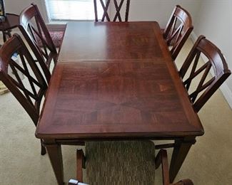 Table with 6 chairs and 1 leaf