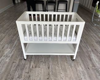 Like new mini crib. The baby used it only a handful of times. Will sell with the mattress and sheets. 