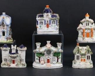 23	Grouping of Staffordshire Cottages	Nine Staffordshire cottage pastille burners and bank. Repairs, cracks, chips, scratches, fading, crazing, scuffs. Tallest 6 1/2" T.
