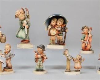 24	10 Hummel Figurines Full Bee & Stylized Bee	10 Hummel porcelain figurines. Sweet Music, Little Fiddler, Chimney Sweep, Heavenly Angel, Serenade, Band Leader, Bird Duet, Stormy Weather, To Market, Little Thrifty coin bank. All with stylized bee marks except Bird Duet, To Market and Little Thrifty with full bee marks. Flake to base of Sweet Music, roughness to hat on Serenade, fingers broken on one hand of Band Leader, chip to base of Bird Duet, candle broken on Heavenly Angel, To Market repaired at knees and chipped at boy's elbow, item in basket chipped on To Market.
