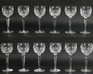 30	12 Waterford Lismore Crystal Hock Wine Glasses	12 Waterford Lismore crystal hock wine glasses 7.5" tall. 4 new in box, boxes show signs of wear and staining. 8 used wine glasses have older mark and have some surface scratches from use, no chips or cracks.
