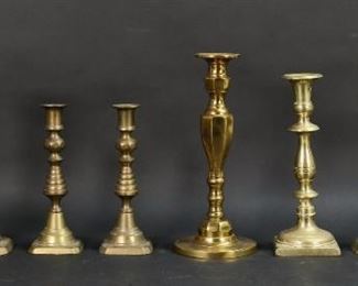 39	8 Brass Candlesticks	8 brass candlesticks, including 2 pairs. Pairs both marked England. Tallest pair 10 3/4"H.
