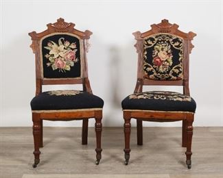 44	Two Victorian Eastlake Style Side Chairs	"Two Victorian Eastlake style side chairs. Late 19th century. Floral needlepoint upholstery and line carved motifs. Nicks and marks to wood throughout both chairs. White scuffs to back of one chair. Fraying to upholstery of both chairs. 

19""W x 21"" D x 37"" H"
