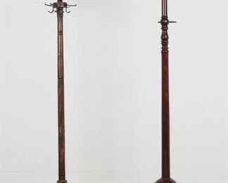 47	Two American Coat Trees	"Two American coat trees. Early 20th century. Tallest coat tree with four cloven feet, shorter with knobby turned legs. Tarnishing to metal hooks of both coat trees. Scuffs, scratches, losses and wear to wood throughout tallest coat tree. Top section of coat tree supporting metal hooks is loose. Wear, marks, scuffs, and scratches throughout post, finial, and legs of shortest coat tree.

Tallest: 18 1/2"" W x 17 1/2"" D x 71 1/4""H. Shortest: 18 1/2"" W x 18"" D x 65 3/8"" H."
