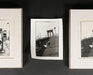 126	3 Chaim Kanner Photographs New York	Chaim Kanner (French / American, 1943-2000). 3 photographs of New York City. 2 Brooklyn Bridge, dated 76; New York, dated 88. Each titled, signed and dated in ink in the lower margin. 1 Brooklyn Bridge unframed. Each image 8 3/4" x 5 3/4" (with frames 14 1/4" x 11 1/4"). Foxing and discoloration to mats, foxing in margins and throughout image in New York, some waviness to unframed photo.
