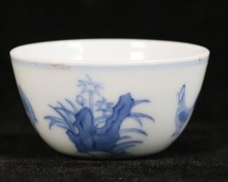 142	Chinese Blue & White Porcelain Cup Chenghua Mark	Chinese porcelain bowl or cup. Blue and white decoration with roosters and plants. Blue 6 character Ming Chenghua mark to the underside. 1 1/4"H x 2 1/4"-diameter.
