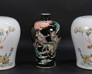 140	3 Pieces Chinese Porcelain	3 pieces Chinese porcelain. Famille noir vase with warriors and battle scene, 9"H; pair of ginger jars with birds and flowers, each 9 3/4"H.
