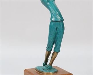 190	Tom Bennett Bronze Golfer Tee Time	Tom Bennett (American, California, 1928-). Patinated bronze of a golfer, Tee Time. Signed, dated 93 and numbered AC on the base. On wooden base. 11"H.
