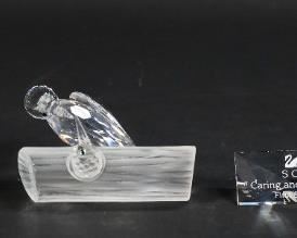199	3 Swarovski Collector's Society Figurines 1987-89	3 Swarovski crystal bird figurines. Collector's Society 1989 Amour Turtle Doves figurine, 4 1/4"L; 1987 Togetherness Lovebirds figurine, 4 1/4"H; 1988 Sharing Woodpeckers, 4"H. All with SCS marks. With a Caring and Sharing First Series plaque. All with original boxes.
