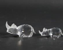 202	6 Swarovski Crystal Elephants, Hippos, Rhinos	6 Swarovski crystal animal figurines. 2 elephants, 2 rhinoceros, 2 hippopotamuses. All with Swarovski swan marks. All with original boxes. Larger elephant 2 3/8"H.
