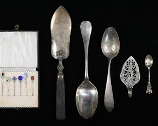 268	Lot of Continental Silver	"Lot of Continental silver, including hallmarked 800 silver spoon, hallmarked German 800 silver pastry server, hallmarked Austro-Hungarian salt spoon, German 750 silver serving spoon, unmarked serving spoon (acid tested), set of 6 Meka Danish sterling and enamel picks in fitted case, fish slice with hallmarked French silver blade.
800 silver 34 grams, Austro-Hungarian spoon 5.5 grams, slice 86 grams including handle, 750 spoon 60 grams, unmarked spoon 94 grams, picks 14.4 grams including enamel."
