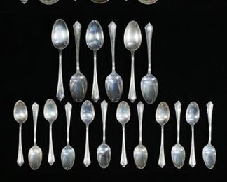 275	38 Pieces Sterling Flatware Gorham & Durgin	38 pieces sterling silver flatware. 24 pieces Gorham Plymouth pattern: 12 teaspoons, 6 tablespoons, 6 cream soup spoons, 751 grams total; 14 pieces Durgin Fairfax pattern: 12 butter spreaders, olive fork, ladle, 306.9 grams total. Tablespoons 7 1/8"L. All monogrammed.
