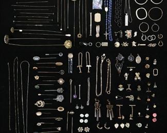 292	Lot of Costume Jewelry & Hat Pins	Lot of hat pins and costume jewelry including rings, single and pairs of earrings, stick pins, bracelets. All as is, with wear, losses and rusting to hat pins, earrings missing backs, and stones missing.

