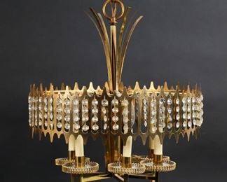 337	Modern Hollywood Regency Chandelier	Mid-century Hollywood Regency style hanging fixture. Gilt metal with 6 lights and glass and gilt metal candle holders. No crystals on center section. 20 3/4"H (to top of ring), 18"-diameter.
