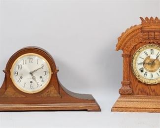 376	2 Mantel Clocks Seth Thomas & Ansonia	2 mantel or shelf clocks. Seth Thomas mantel clock 20 1/2"L x 9 1/2"H; Ansonia "Tunis" shelf clock, 14"H. Separation of wood on rear door of Seth Thomas clock, scratches and discoloration to face; minor chips along top of Ansonia clock.
