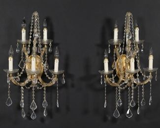 370	Pair of Hollywood Regency Crystal Sconces	Pair of Hollywood Regency style crystal sconces. Each with 5 arms. 19"H x 15 1/2"W.
