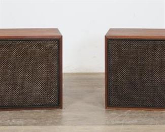 385	Pair of Mid Century JBL LX4-1 Speakers	"Pair of Mid Century JBL LX4-1 speakers. James B. Lansing, Inc, Los Angeles, CA, mid 20th century. Walnut cased LX-41 speakers, Type E8-99, Lancer 99. Speaker serial numbers 98707 and 98710. JBL labels on back of both speakers. Recessed area on back of speaker 98710. Chips to wood on back right edge and back left corner of speaker 98710. Scratches and marks throughout wood of both speakers. Heavy white scuffing and scratches to left side of speaker 98707. Chip to wood on bottom left corner of front of speaker 98707. Scratches and scuffs to bottom of both speakers. Speakers have not been tested.

14 1/8"" H x 23 1/2"" L x 11 3/4"" D"
