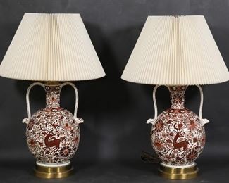 417	Pair of Icaros Pottery Amphora Vase Lamps	Pair of pottery amphora vase lamps, with Icaros Rhodes Greece hand painted design. Each 30 1/4"H including finials. Repair to end of one handle.
