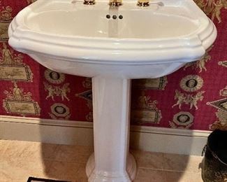 #63) - $150 - Pedestal sink with Brass Kohler fixtures	28x20x35. Purchaser is responsible to deinstall from the home prior to March 31.