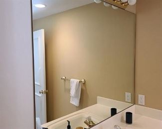 #132) - $40 -Bathroom Wall Mount Plate Mirror	52x42. Purchaser is responsible to deinstall from the home prior to March 31.