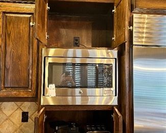 #L $200) Kitchen Cabinet Sections (Upper cabinet, Microwave cutout, Countertop Small appliance cabinet). Beautiful Hardwood Cabinets with soft close drawer hardware and Upper Cap.  28 1/2 W x 20 D x 62 H.  Purchaser must remove on their own or with their own contractor help prior to March 31. 