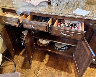 #N $1000) Kitchen Cabinet Sections (Lower Cabinets, Granite Countertop, Sink, Trash Cabinet, Dishwasher cutout, cabinets, and Drawers, spice Drawers). Beautiful Hardwood Cabinets with soft close drawer hardware and Upper Cap.  28 1/2 W x 20 D x 62 H.  Purchaser must remove on their own or with their own contractor help prior to March 31. 