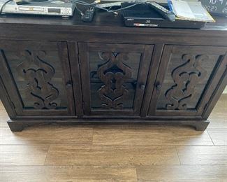 Carved T.V. console