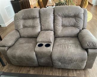 Matching electric reclining love seat