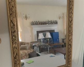 Gold tone framed mirror