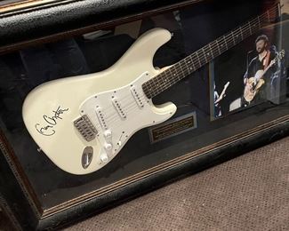 Signed Eric Clapton with Authenticity on back. 