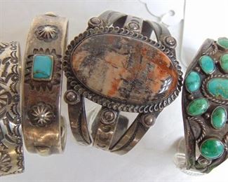 Large collection of Navajo Old Pawn silver cuffs, earrings